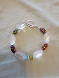 White oblong and different color bracelet