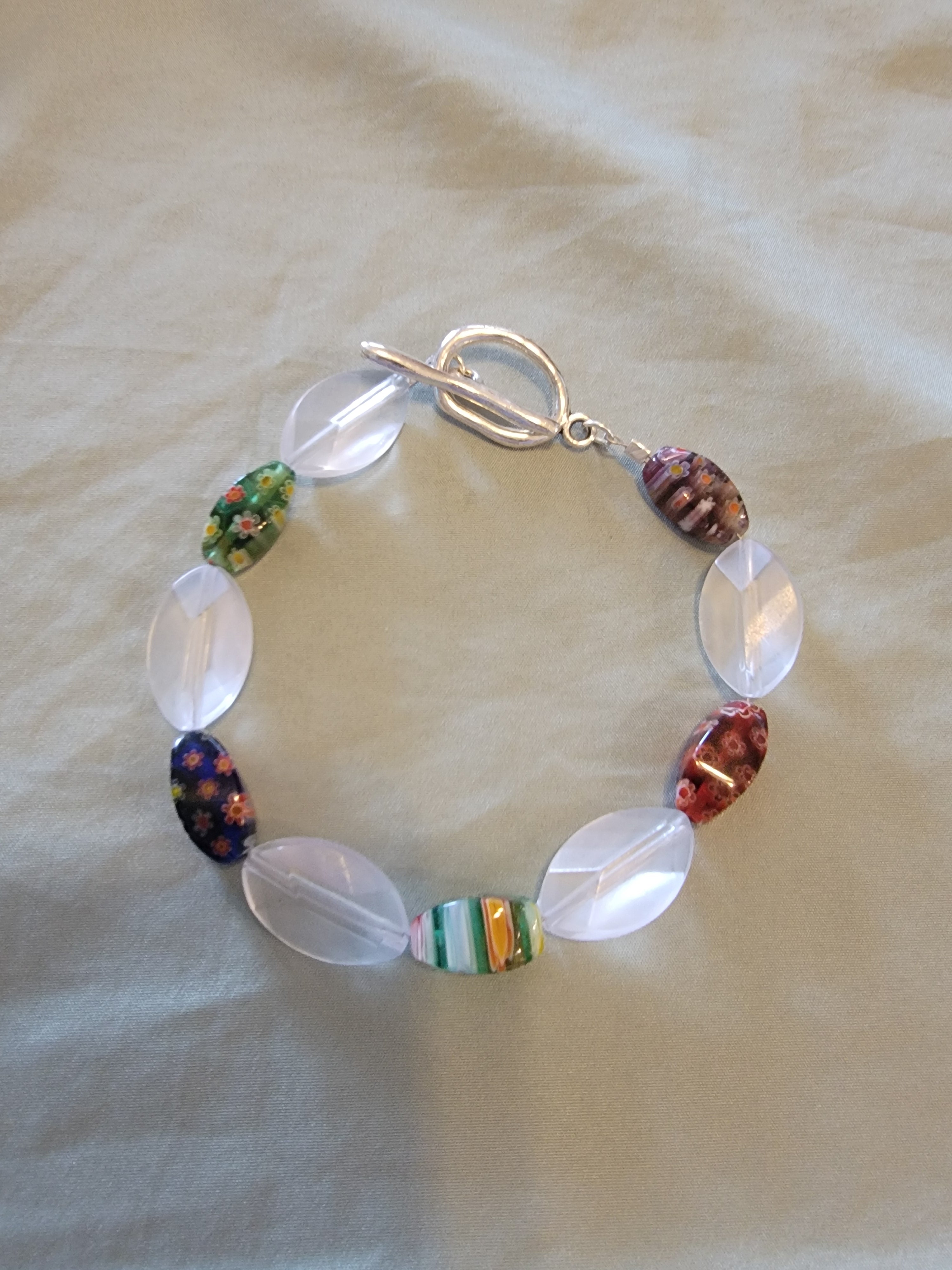 White oblong and different color bracelet