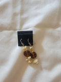 Brown and white earrings