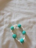 White and teal  bracelet