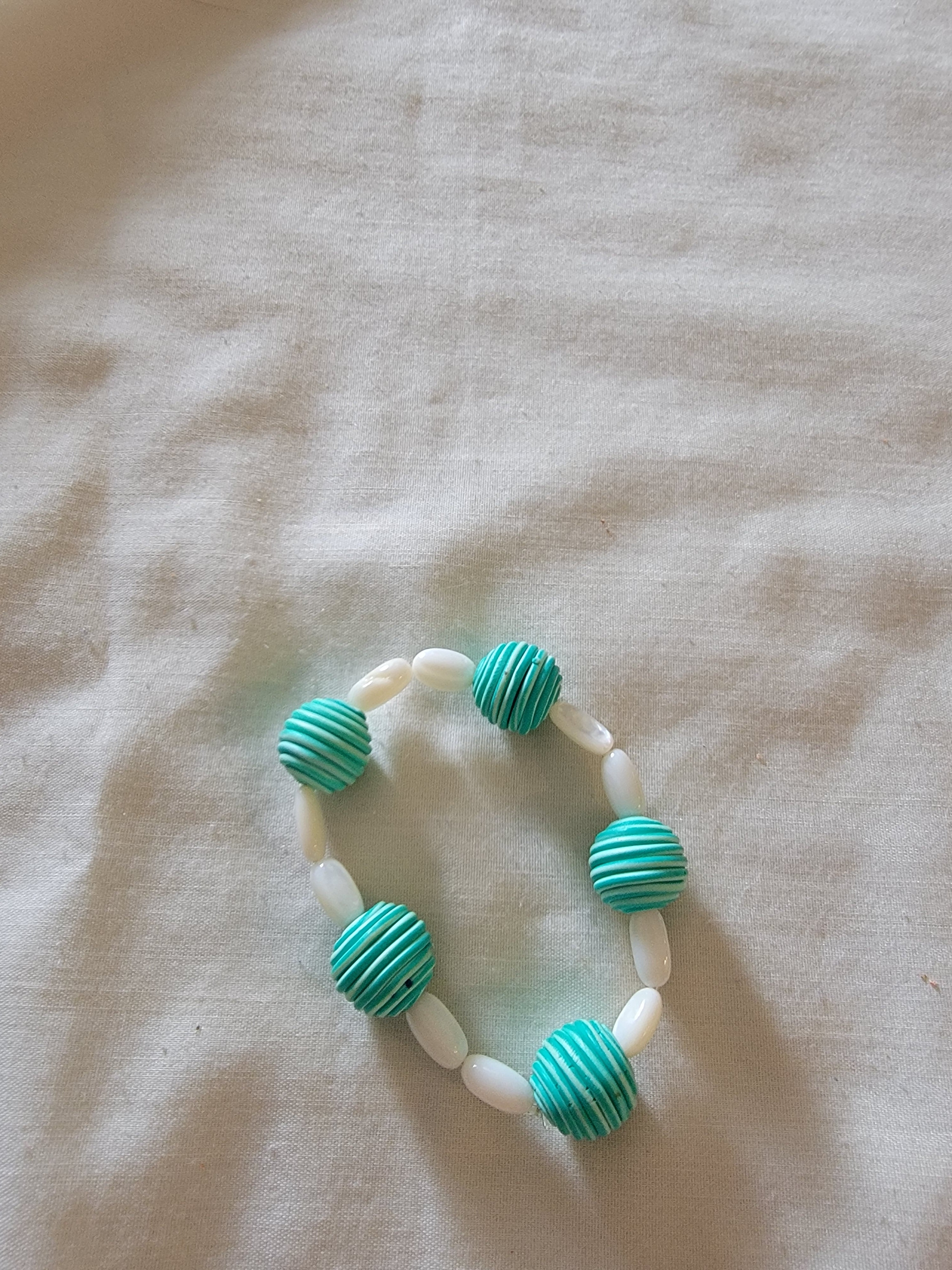 White and teal  bracelet