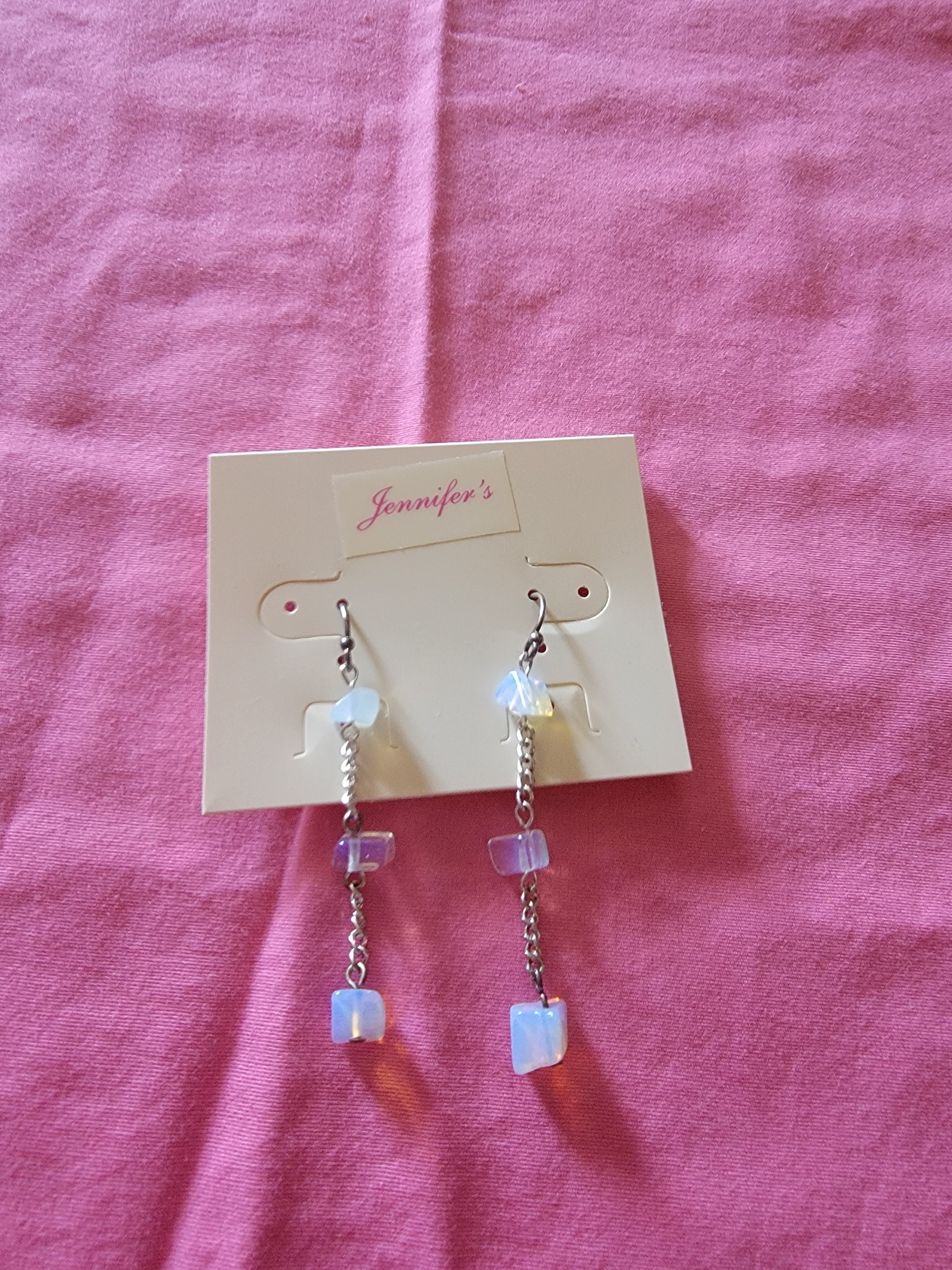 Long white earrings