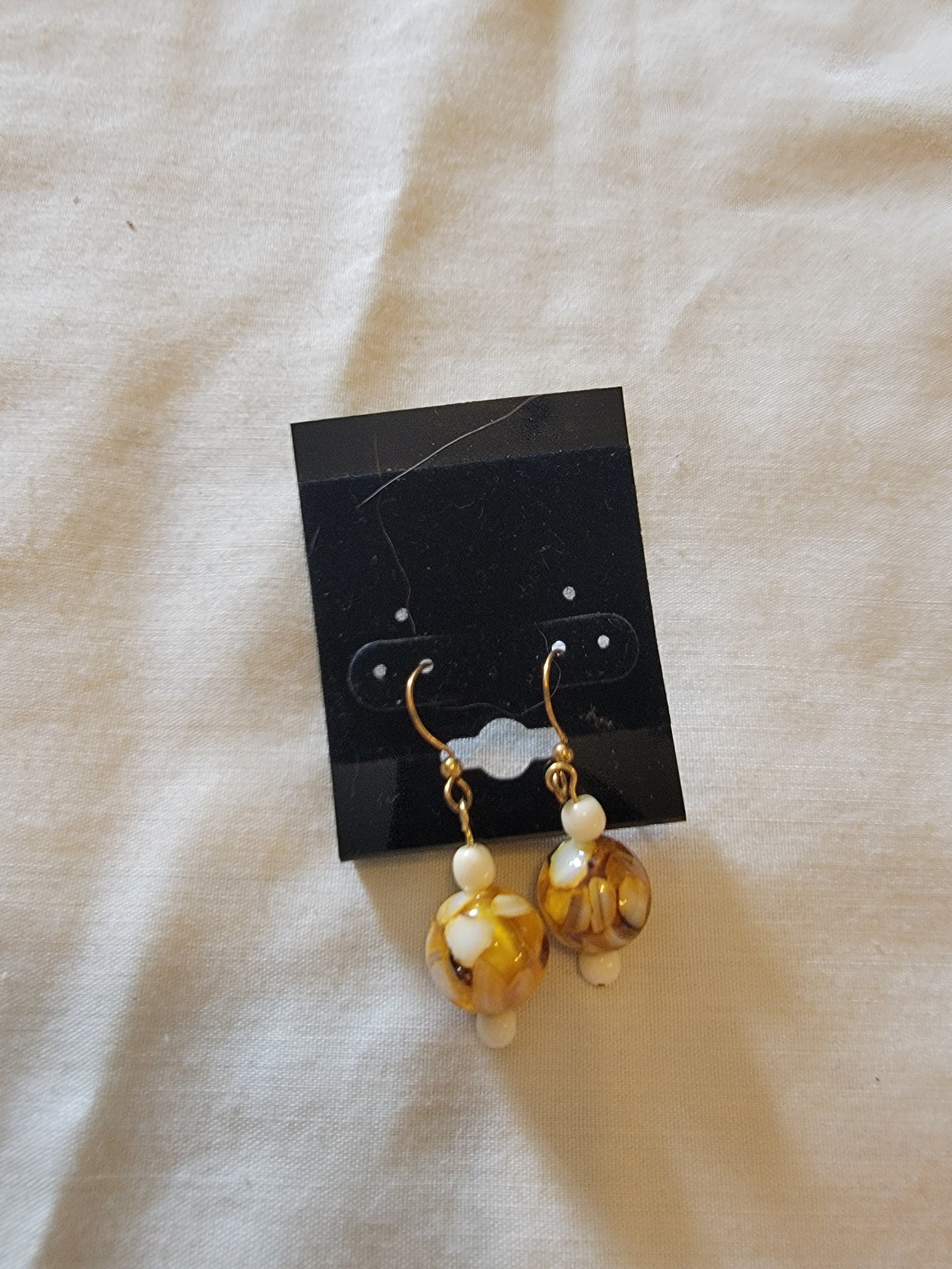 Yellow and brown earrings